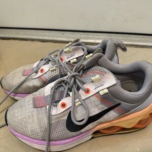 Nike Gray and Pink Athletic Shoes with Sporty Design